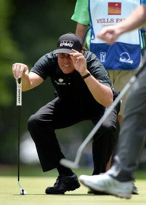 May 5, 2016 - Charlotte, NC, USA - Phil Mickelson looks to get a quick look at his line on the ninth green during second round action of the Wells Fargo Championship at Quail Hollow Club on May 6, 2016 in Charlotte, N.C. Mickelson finished the round at -5. Wells Fargo Championship - ZUMAm67_