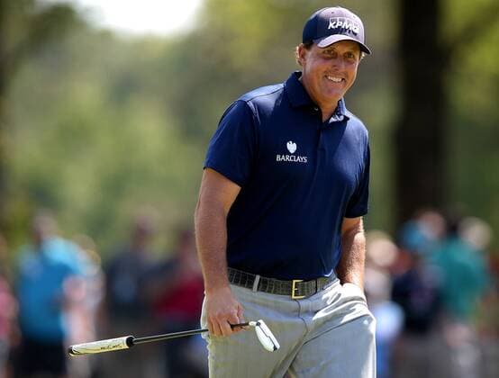 May 7, 2016 - Charlotte, NC, USA - Phil Mickelson smiles as he is greeted by the gallery at the 9th green in the third round of the Wells Fargo Championship at Quail Hollow Club in Charlotte, N.C., on Saturday, May 7, 2016. Wells Fargo Championship, third round - ZUMAm67_