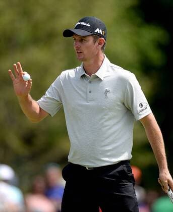 May 7, 2016 - Charlotte, NC, USA - Justin Rose acknowledges the applause of the gallery after sinking a putt on the 9th green in the third round of the Wells Fargo Championship at Quail Hollow Club in Charlotte, N.C., on Saturday, May 7, 2016. Wells Fargo Championship, third round - ZUMAm67_