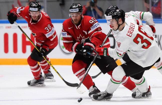 ST. PETERSBURG, RUSSIA. MAY 8, 2016. Canada s Boone Jenner, Ryan O Reilly and Hungary s Csanad Erdely (L-R) fight for the puck in their 2016 IIHF World Championship WM Weltmeisterschaft Preliminary Round Group B Ice hockey Eishockey match at the Yubileyny Sports Palace. Alexander Demianchuk TASS  TS021FE9