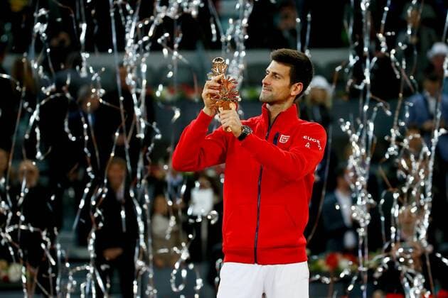 Serbian tennis player Novak Djokovic pose with the winner trophy after his victory 6-2, 3-6 and 6-3 against Scottish Andy Murray during their Mutua Madrid Open male final match played at the Caja Magica tennis complex in Madrid, Spain, on 08 May 2016. Novak Djokovic vs Andy Murray !ACHTUNG: NUR REDAKTIONELLE NUTZUNG!  20160508-635983405061692025