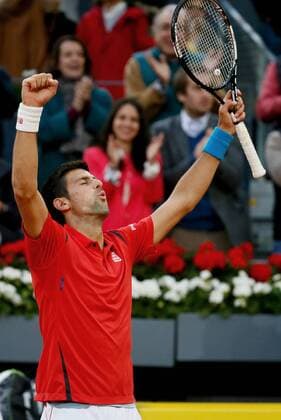 Serbian tennis player Novak Djokovic reacts after his victory 6-2, 3-6 and 6-3 against Scottish Andy Murray during their Mutua Madrid Open male final match played at the Caja Magica tennis complex in Madrid, Spain, on 08 May 2016. Novak Djokovic vs Andy Murray !ACHTUNG: NUR REDAKTIONELLE NUTZUNG!  20160508-635983406605624025