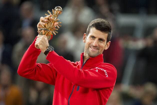 Serbian Novak Djokovic with the championship awards during TPA Finals Mutua Madrid Open Tennis 2016 in Madrid, May 08, 2016.  (20160508159)