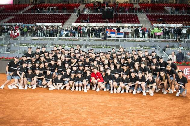 Serbian Novak Djokovic pose for the media with all the ball boys during TPA Finals Mutua Madrid Open Tennis 2016 in Madrid, May 08, 2016.  (70947764)