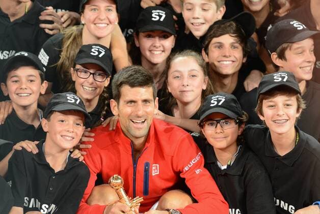 May 8, 2016 - Madrid, Spain - NOVAK DJOKOVIC poses with ball kids after winning the the Mutua Madrid Open. Tennis 2016 - Mutua Madrid Open - Day 9 - ZUMAl132