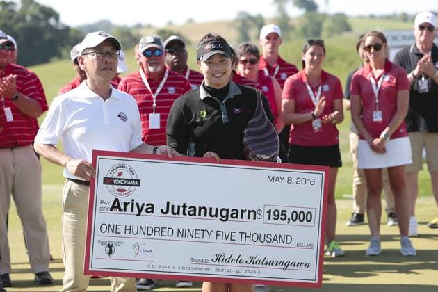 May 8, 2016: Ariya Jutanugarn of Bangkok Thailand gets her paycheck after winning the final round of the Yokohama Tire LPGA Golf Damen Classic at the RTJ Capitol Hill Golf Course, Prattville, AL. (Photo by Bobby McDuffie ICON Sportswire) GOLF: MAY 08 LPGA - Yokohama Tire LPGA Classic - Final Round Icon16050812 EDITORIAL USE ONLY