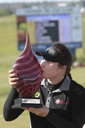 May 8, 2016: Ariya Jutanugarn of Bangkok Thailand kisses her championship trophy after winning the final round of the Yokohama Tire LPGA Golf Damen Classic at the RTJ Capitol Hill Golf Course, Prattville, AL. (Photo by Bobby McDuffie ICON Sportswire) GOLF: MAY 08 LPGA - Yokohama Tire LPGA Classic - Final Round Icon16050814 EDITORIAL USE ONLY