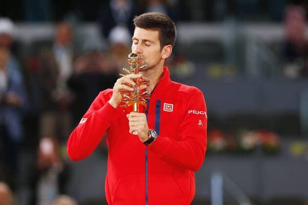 Novak Djokovic (SER), MAY 8, 2016 - Tennis : Novak Djokovic of Serbia kiss to his trophey during awards ceremony of singls final match against Andy Murray of Britain on the ATP Tennis Herren World Tour Masters 1000 Mutua Madrid Open tennis tournament at the Caja Magica in Madrid, Spain, May 8, 2016. Noxthirdxpartyxsales  (heha025317)