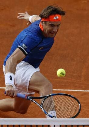 Italy: Tennis BNL Rome 2016 David Ferrer of Spain returns the ball during first round match of the Italian Open tennis BNL2016 tournament against Filippo Volandri of Italy at the Foro Italico.  CiroxDexLuca