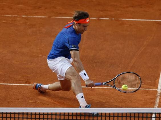 Italy: Tennis BNL Rome 2016 David Ferrer of Spain returns the ball during first round match of the Italian Open tennis BNL2016 tournament against Filippo Volandri of Italy at the Foro Italico.  CiroxDexLuca