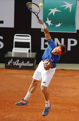 Italy: Tennis BNL Rome 2016 David Ferrer of Spain returns the ball during first round match of the Italian Open tennis BNL2016 tournament against Filippo Volandri of Italy at the Foro Italico.  CiroxDexLuca
