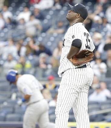 New York Yankees starting pitcher Michael Pineda reacts after Kansas City Royals Salvador Perez hits a 3-run home run in the first inning at Yankee Stadium in New York City on May 11, 2016.  NYP20160511111 JOHNxANGELILLO