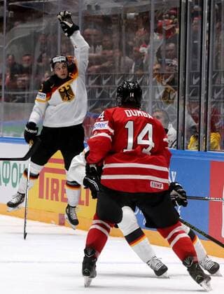 ST. PETERSBURG, RUSSIA. MAY 12, 2016. Germany s Marcel Goc (L) and Canada s Matt Dumba in action in their 2016 IIHF World Championship WM Weltmeisterschaft Preliminary Round Group B Ice hockey Eishockey match at Yubileyny Sports Palace. Team Canada won the game 5:2. Alexander Demianchuk TASS  TS022B53