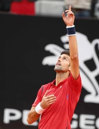 Italy: Tennis ATP Tennis Herren in Rome Novak Djokovic of Serbia celebrates after winning the quarter-final match of the Italian Open tennis BNL2016 tournament against Rafael Nadal of Spain at the Foro Italico in Rome.  CiroxdexLuca