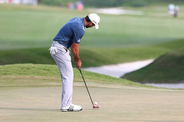 Golf, The Players Championship in Ponte Vedra Beach May 13, 2016 - Ponte Vedra Beach, Florida, United States - Jason Day putts the 9th green during the second round of The PLAYERS Championship at TPC Sawgrass. Golf 2016 - The PLAYERS Championship - Round 2 - ZUMAw109
