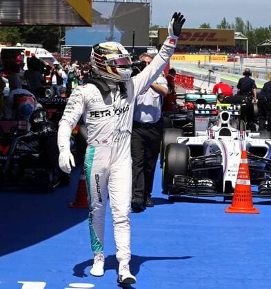 British Formula One driver Lewis Hamilton, of Mercedes, celebrates after winning the pole position in qualification session at the Barcelona-Catalunya circuit in Montmelo at Barcelona, Spain, on 14 May 2016. The Spanish Formula One Grand Prix will take place on 15 May 2016. SPANISH GRAND PRIX !ACHTUNG: NUR REDAKTIONELLE NUTZUNG!  GRA192 20160514-635988373086696552
