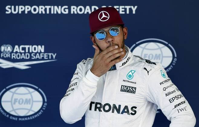 British Formula One driver Lewis Hamilton, of Mercedes, celebrates after winning the pole position in qualification session at the Barcelona-Catalunya circuit in Montmelo at Barcelona, Spain, on 14 May 2016. The Spanish Formula One Grand Prix will take place on 15 May 2016. SPANISH GRAND PRIX !ACHTUNG: NUR REDAKTIONELLE NUTZUNG!  GRA192 20160514-635988376038372552