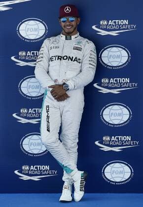 British Formula One driver Lewis Hamilton, of Mercedes, celebrates after winning the pole position in qualification session at the Barcelona-Catalunya circuit in Montmelo at Barcelona, Spain, on 14 May 2016. The Spanish Formula One Grand Prix will take place on 15 May 2016. SPANISH GRAND PRIX !ACHTUNG: NUR REDAKTIONELLE NUTZUNG!  GRA192 20160514-635988376083144552