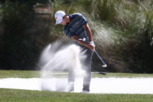 May 14, 2016 - Ponte Vedra Beach, Florida, United States - Si Woo Kim hits out of a bunker on the 15th hole during the third round of The PLAYERS Championship at TPC Sawgrass. Golf 2016 - The PLAYERS Championship - Round 3 - ZUMAw109