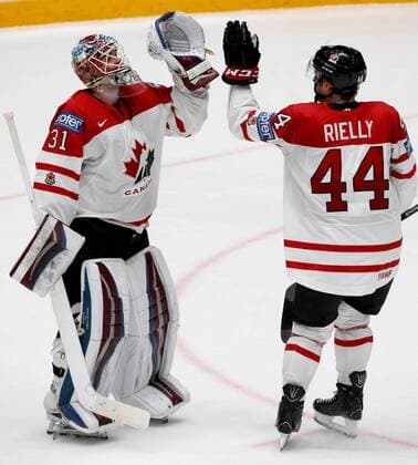 ST. PETERSBURG, RUSSIA. MAY 16, 2016. Canada s goalie Calvin Pickard (L) and Morgan Rielly high five in the 2016 IIHF World Championship WM Weltmeisterschaft Preliminary Round Group B Ice hockey Eishockey match against France at Yubileyny Sports Palace. The Canadian Team won the game 4:0. Alexander Demianchuk TASS  TS0233D4