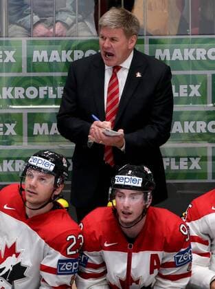 Canada s Bill Peters (background) reacts in their 2016 IIHF World Championship WM Weltmeisterschaft quarter-final Ice hockey Eishockey match against Sweden at the Yubileyny Sports Palace in St. Petersburg, Russia, May 19, 2016. Alexander Demianchuk TASS  TS023C75