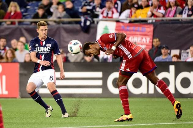 Saturday, May 21, 2016: FC Dallas forward Atiba Harris (14) uses his head to block a pass from New England Revolution defender Chris Tierney (8) during the MLS Fussball Herren USA game between FC Dallas and the New England Revolution held at Gillette Stadium in Foxborough Massachusetts. MLS 2016: Dallas vs Revolution MAY 21 - ZUMAc04_