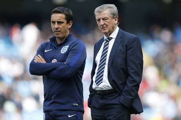 Gary Neville and Roy Hodgson, England manager during the International Friendly Länderspiel match at the Etihad Stadium. Photo credit should read: Philip Oldham Sportimage EDITORIAL USE ONLY. No use with unauthorised audio, video, data, fixture lists, club league logos or live services. Online in-match use limited to 120 images, no video emulation. No use in betting, games or single club league player publications.