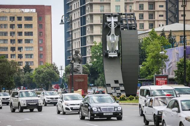 Baku: A silver car advertises A silver car advertises the first Baku Grand Prix.  AzizxKarimov