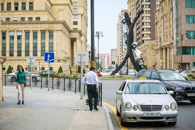 Baku: A silver car advertises A silver car advertises the first Baku Grand Prix.  AzizxKarimov