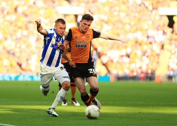 28.05.2016. Wembley Stadium, London, England. Skybet Championship Play Off Final. Sheffield Wednesday versus Hull. Hull City Defender Andrew Robertson feels pressure from Sheffield Wednesday Defender Jack Hunt xMarkxKertonx  ActionPlus11742681