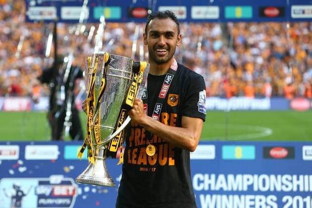 Hull s Ahmed Elmohamady celebrates promotion with the cup during the Skybet Championship Play Off Final match at Wembley Stadium. Photo credit should read: Philip Oldham Sportimage EDITORIAL USE ONLY. No use with unauthorised audio, video, data, fixture lists, club league logos or live services. Online in-match use limited to 120 images, no video emulation. No use in betting, games or single club league player publications.