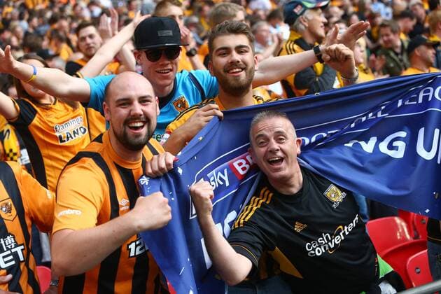 Hull fans celebrate promotion during the Skybet Championship Play Off Final match at Wembley Stadium. Photo credit should read: Philip Oldham Sportimage EDITORIAL USE ONLY. No use with unauthorised audio, video, data, fixture lists, club league logos or live services. Online in-match use limited to 120 images, no video emulation. No use in betting, games or single club league player publications.