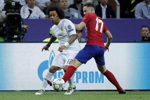 Real Madrid s Brazilian defense Marcelo Vieira (L) fights for the ball with Atletico de Madrid s midfielder Saul Niguez during thir UEFA Champions League final match at San Siro stadium in Milan, Italy, 28 May 2016. REAL MADRID VS ATLETICO DE MADRID !ACHTUNG: NUR REDAKTIONELLE NUTZUNG!  MIL015 20160528-636000662735009545
