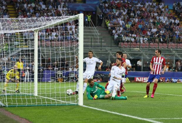 Sergio Ramos of Real Madrid scoring the first goal past Jan Oblak of Atletico Madrid during the UEFA Champions League Final match at the Giuseppe Meazza Stadium, Milan, Italy. Photo credit should read: David Klein Sportimage EDITORIAL USE ONLY. No use with unauthorised audio, video, data, fixture lists, club league logos or live services. Online in-match use limited to 120 images, no video emulation. No use in betting, games or single club league player publications.