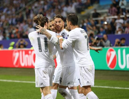 Sergio Ramos of Real Madrid (r) celebrates scoring the first goal during the UEFA Champions League Final match at the Giuseppe Meazza Stadium, Milan, Italy. Photo credit should read: David Klein Sportimage EDITORIAL USE ONLY. No use with unauthorised audio, video, data, fixture lists, club league logos or live services. Online in-match use limited to 120 images, no video emulation. No use in betting, games or single club league player publications.