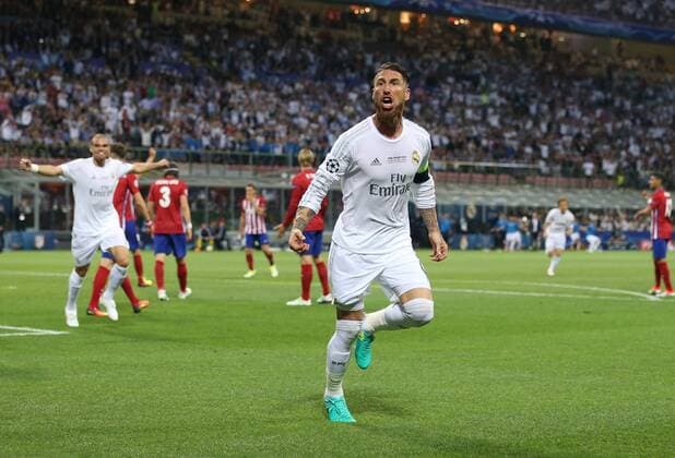 Sergio Ramos of Real Madrid (r) celebrates scoring the first goal during the UEFA Champions League Final match at the Giuseppe Meazza Stadium, Milan, Italy. Photo credit should read: David Klein Sportimage EDITORIAL USE ONLY. No use with unauthorised audio, video, data, fixture lists, club league logos or live services. Online in-match use limited to 120 images, no video emulation. No use in betting, games or single club league player publications.