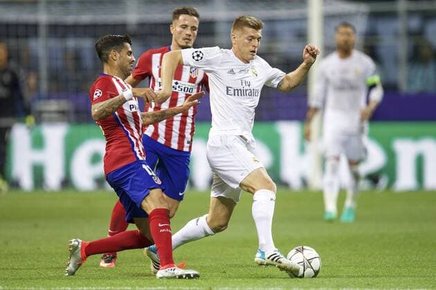 (L-R) Augusto Fernandez of Club Atletico de Madrid, Saul Niguez of Club Atletico de Madrid, Toni Kroos of Real Madrid during the UEFA Champions League final match between Real Madrid and Atletico Madrid on May 28, 2016 at the Giuseppe Meazza San Siro stadium in Milan, Italy. Real Madrid v Atletico Madrid UEFA Champions League final 2015 2016 xVIxxIVx 5566836