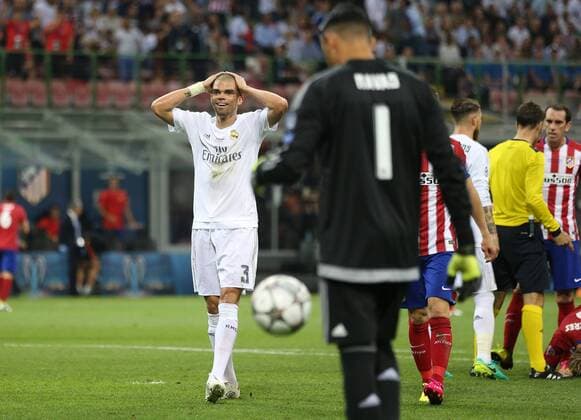 Pepe of Real Madrid reacts after conceding a penalty during the UEFA Champions League Final match at the Giuseppe Meazza Stadium, Milan, Italy. Photo credit should read: David Klein Sportimage EDITORIAL USE ONLY. No use with unauthorised audio, video, data, fixture lists, club league logos or live services. Online in-match use limited to 120 images, no video emulation. No use in betting, games or single club league player publications.