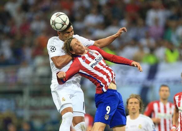 Casemiro of Real Madrid tussles with Fernando Torres of Atletico Madrid during the UEFA Champions League Final match at the Giuseppe Meazza Stadium, Milan, Italy. Photo credit should read: David Klein Sportimage EDITORIAL USE ONLY. No use with unauthorised audio, video, data, fixture lists, club league logos or live services. Online in-match use limited to 120 images, no video emulation. No use in betting, games or single club league player publications.