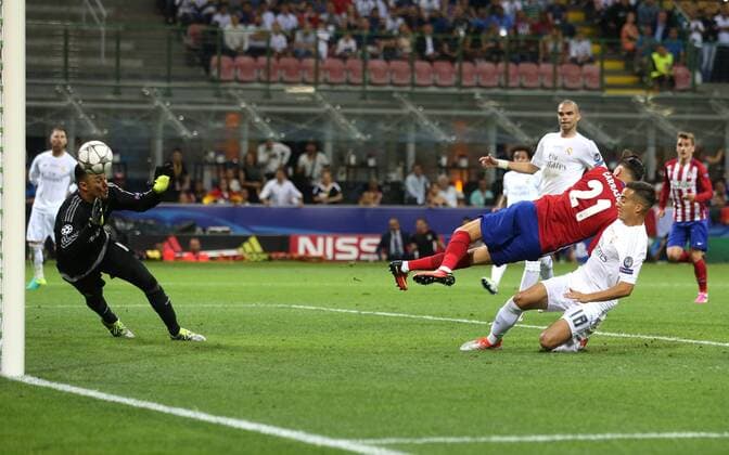 Yannick Carrasco of Atletico Madrid scores the equaliser during the UEFA Champions League Final match at the Giuseppe Meazza Stadium, Milan, Italy. Photo credit should read: David Klein Sportimage EDITORIAL USE ONLY. No use with unauthorised audio, video, data, fixture lists, club league logos or live services. Online in-match use limited to 120 images, no video emulation. No use in betting, games or single club league player publications.