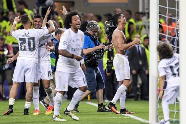 160528 Real Madrids Cristiano Ronaldo (th) jublar efter att han satt sin straff och avgjort finalen i Champions League mellan Real Madrid och Atletico Madrid den 28 maj 2016 i Milano.  Copyright: JOELxMARKLUND BB160528JM070