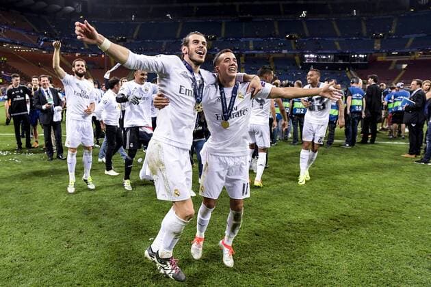 160528 Real Madrids Gareth Bale och Lucas Vazquez jublar efter att Real Madrid vunnit finalen i Champions League mellan Real Madrid och Atletico Madrid den 28 maj 2016 i Milano.  Copyright: JOELxMARKLUND BB160528JM088