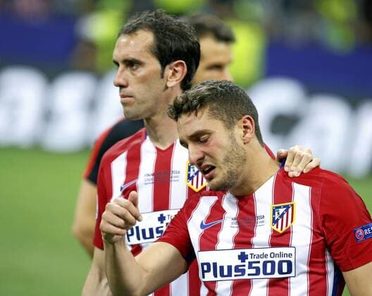 Champions League final between Real Madrid and Atletico. In this picture, Godin and Koke dejected. xRAFAxCASALx 