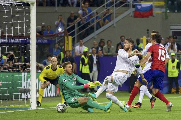 (L-R) goalkeeper Jan Oblak of Club Atletico de Madrid, Sergio Ramos of Real Madrid, Cristiano Ronaldo of Real Madrid, Stefan Savic of Club Atletico de Madrid 1-0 during the UEFA Champions League final match between Real Madrid and Atletico Madrid on May 28, 2016 at the Giuseppe Meazza San Siro stadium in Milan, Italy. Real Madrid v Atletico Madrid UEFA Champions League final 2015 2016 xVIxxIVx 5568717