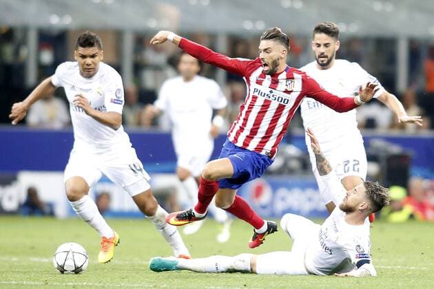 Real Madrid s Carlos Henrique Casemiro (l), Sergio Ramos (c-r) and Isco (r) and Atletico de Madrid s Yannick Ferreira Carrasco during UEFA Champions League 2015 2016 Final match.May 28,2016.  (20160528150)