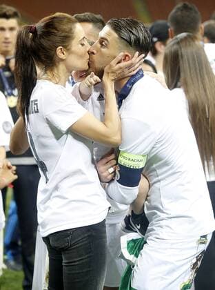 Real Madrid s Sergio Ramos celebrates with his wife, the Spanish actress Pilar Rubio and his son the victory in the UEFA Champions League 2015 2016 Final match.May 28,2016.  (20160528244)