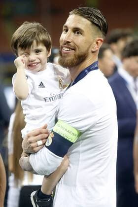 Real Madrid s Sergio Ramos celebrates with his son the victory in the UEFA Champions League 2015 2016 Final match.May 28,2016.  (20160528246)