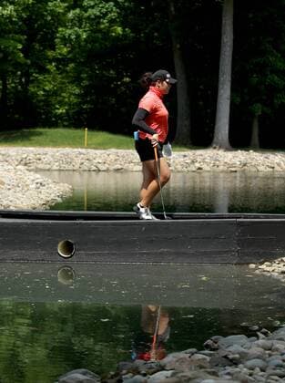 May 28, 2016 - Ann Arbor, Michigan, USA - Aria Jutanugarn of Bangkok, Thailand walks across the foot bridge to the fourth green during the third round of the inaugural LPGA Golf Damen Volvik Championship at Travis Pointe Country Club in Ann Arbor, MI, USA Saturday, May 28, 2016. LPGA Volvik Championship - Round Three  - ZUMAn230