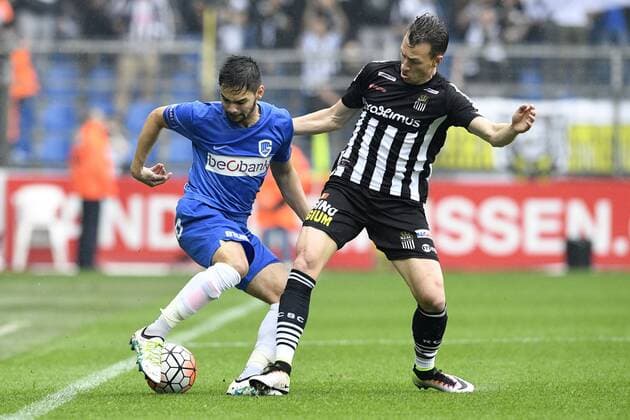 Genk s Sandy Walsh and Charleroi s Clement Tainmont fight for the ball during the Jupiler Pro League match between RC Genk and Charleroi, in Genk, on Sunday 29 May 2016, return leg match for European barrage in the Belgian soccer championship. YORICKxJANSENS  x04861099x
