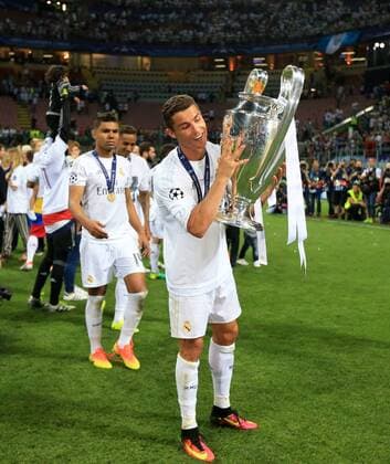 Real Madrid s Cristiano Ronaldo celebrates with the trophy during the UEFA Champions League Final match at the Stadio Giuseppe Meazza. Photo credit should read: David Klein Sportimage EDITORIAL USE ONLY. No use with unauthorised audio, video, data, fixture lists, club league logos or live services. Online in-match use limited to 120 images, no video emulation. No use in betting, games or single club league player publications.